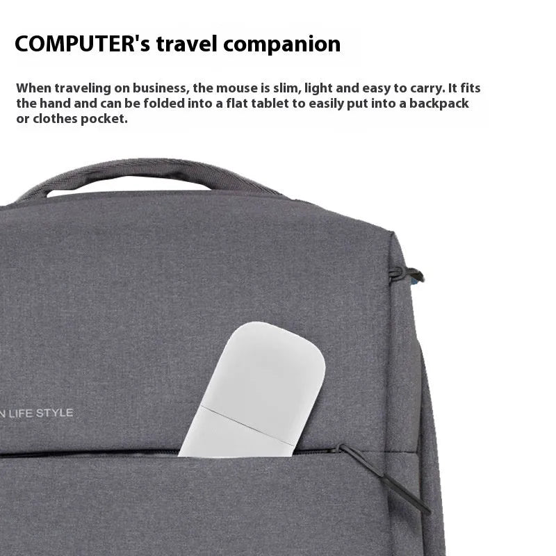 Folding wireless Bluetooth mouse showing compact design with touch surface and portable folded position