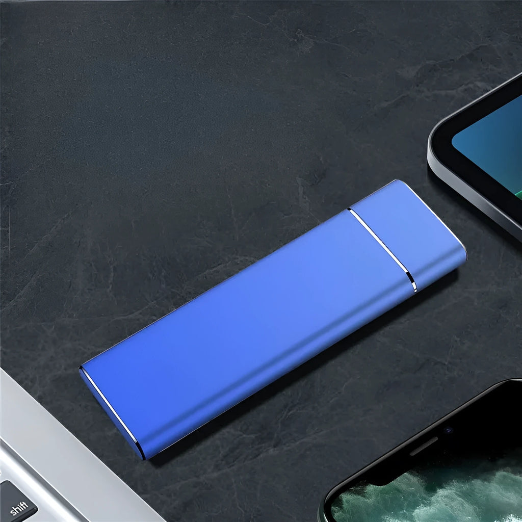 Sapphire blue portable metal external hard drive with USB cable on a white background.