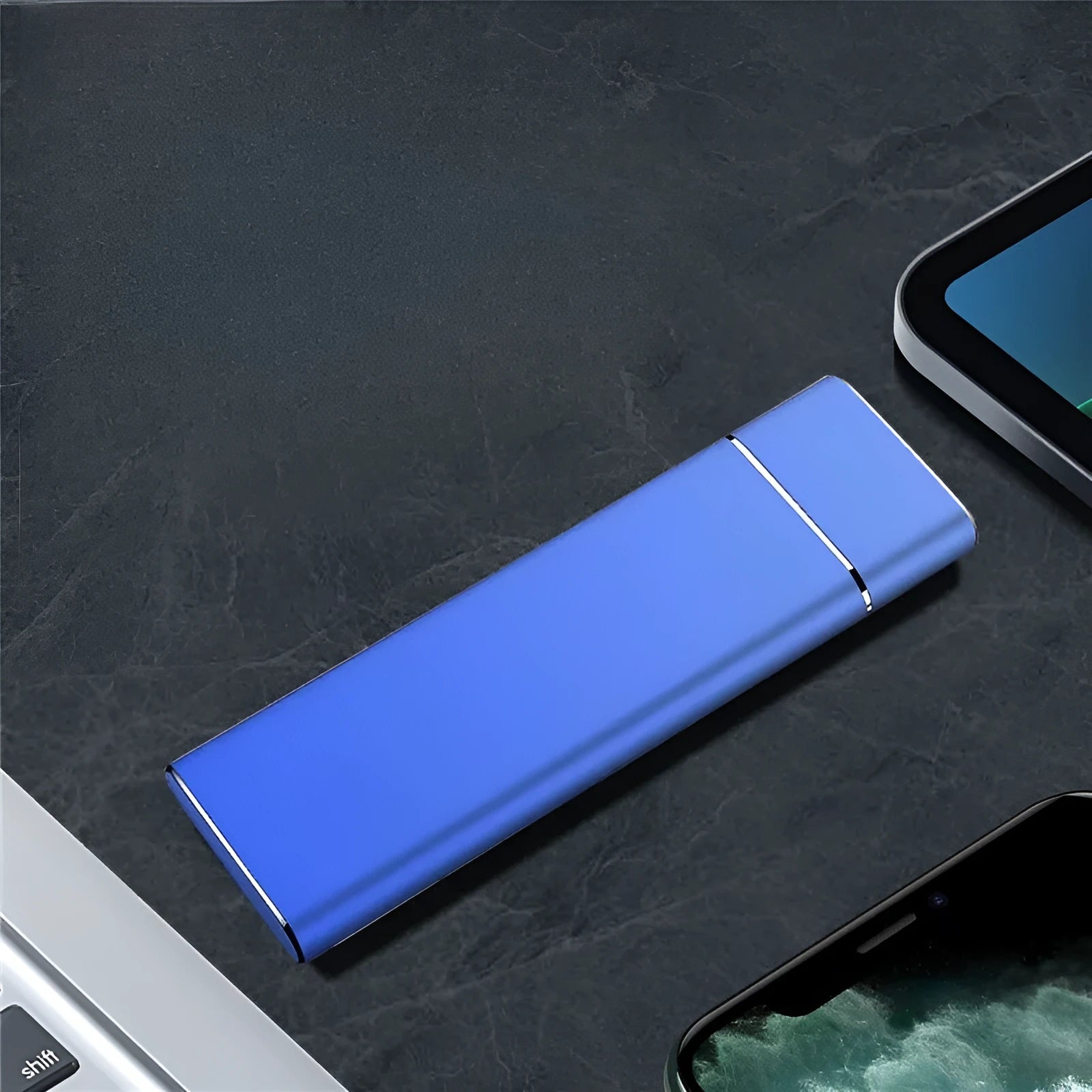 Sapphire blue portable metal external hard drive with USB cable on a white background.