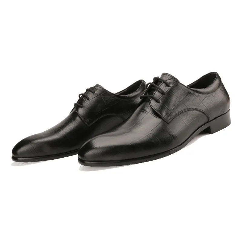 Men's black leather Derby shoes with checkered pattern detailing and pointed toe caps