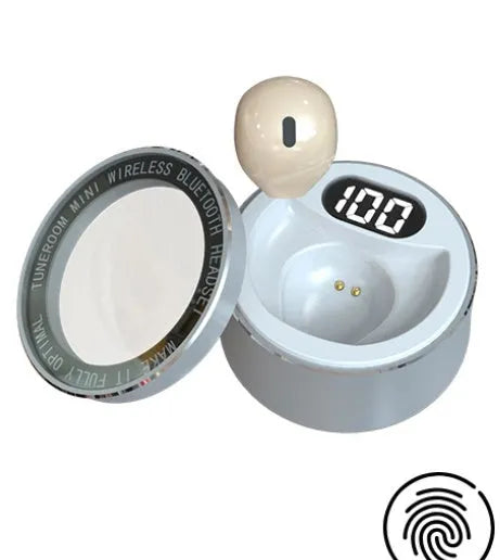 Close-up of a small 9mm skin tone Bluetooth earpiece designed to be invisible in the ear.
