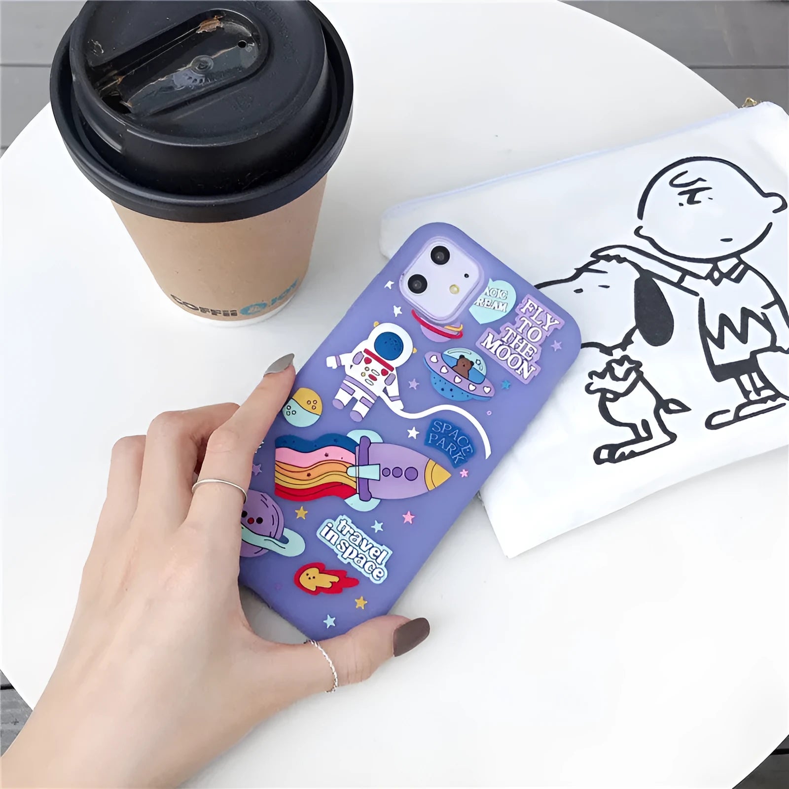 Purple silicone phone case with 3D stereoscopic astronaut and rocket design for Apple iPhone
