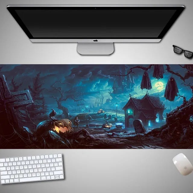 Oversized Halloween-themed gaming mouse pad with non-slip base on a desk.