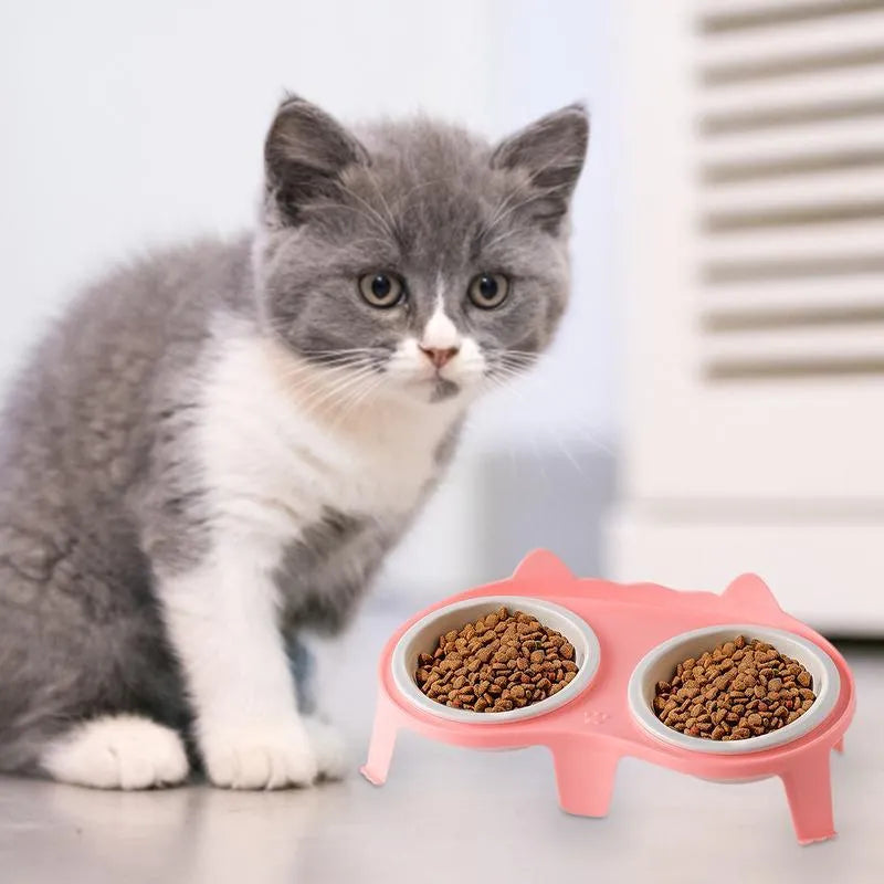 Ceramic cat food and water bowl set on tilted elevated stand in blue, pink, white or yellow colours