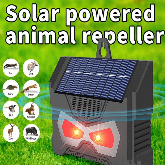 Black solar powered ultrasonic animal repeller outdoor device with flashing LED lights for garden pest control