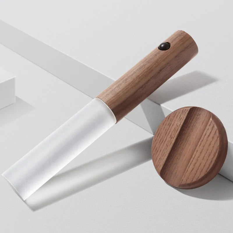 Smart sensor LED desk lamp with solid wood base showing compact design and warm white illumination