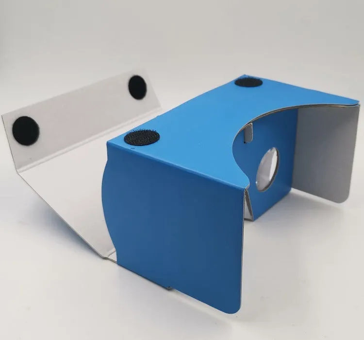Pink cardboard VR glasses with 3D lenses and adjustable rubber band head strap for smartphones