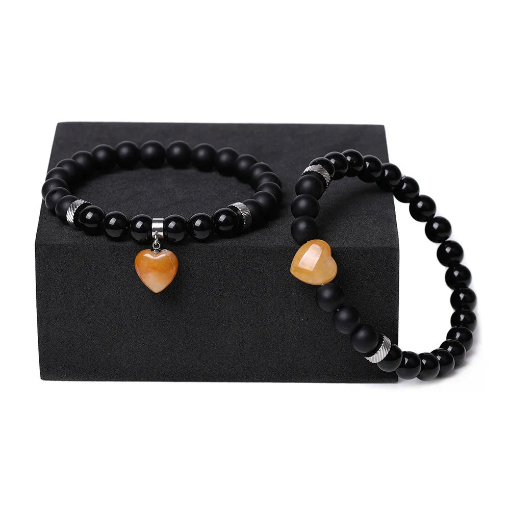 Two polished natural stone heart bracelets for couples in a choice of eight colours