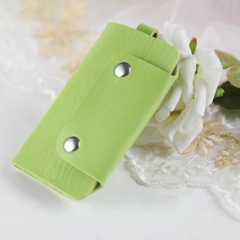 Soft PU leather colour button key case in square vertical section with key bit and cover opening in plain Korean style