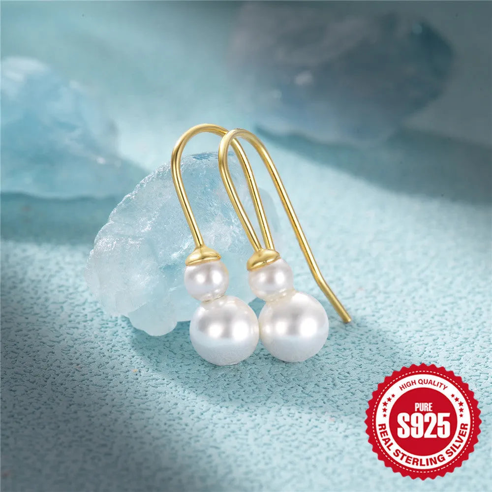 Golden geometric sunflower earrings made from S925 sterling silver with inlaid zircon stones.
