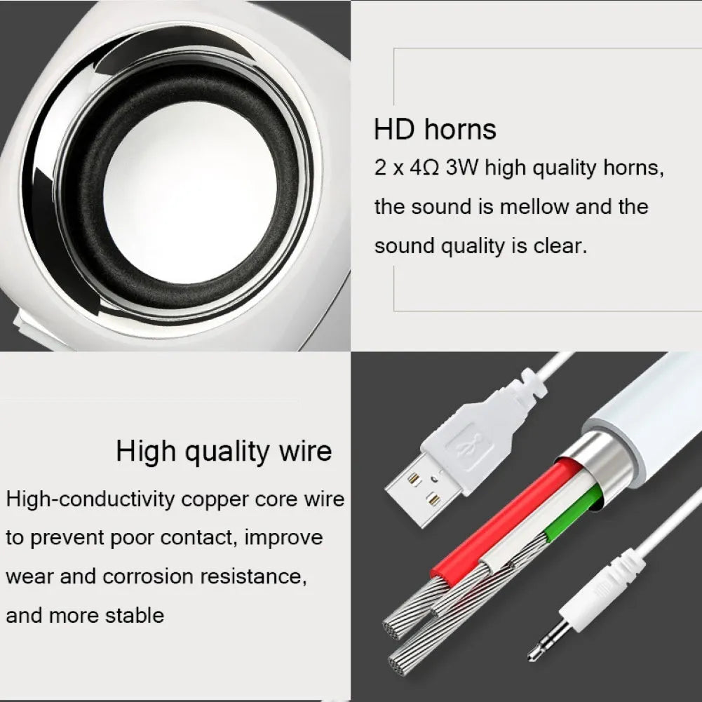 Compact black desktop speakers with 3.5mm cable and volume scroll wheel
