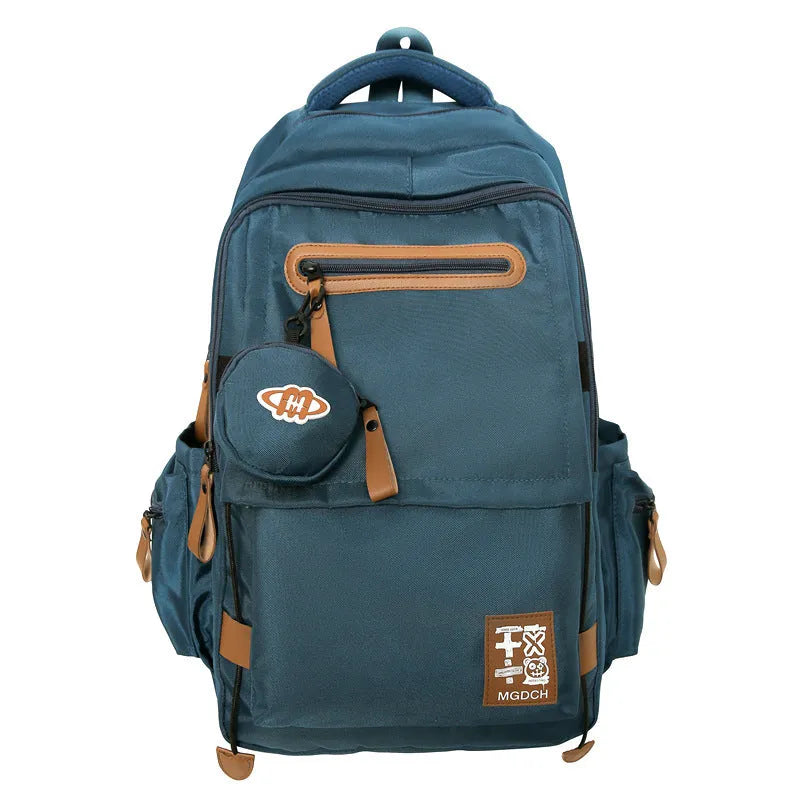 Large nylon school backpack in blue with curved shoulder straps and street style sewing detail