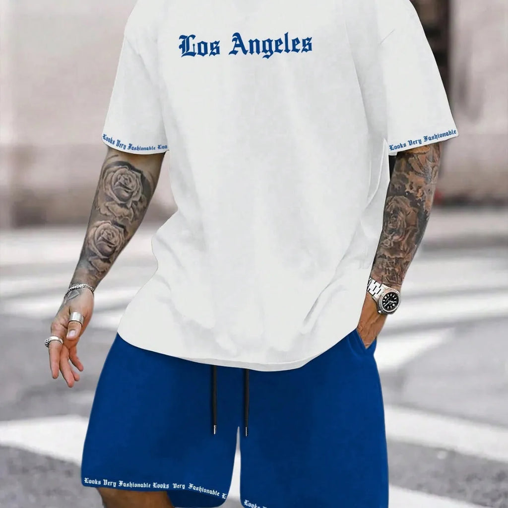 Sports style short-sleeved top and matching shorts set laid flat, showing thin polyester blend fabric.