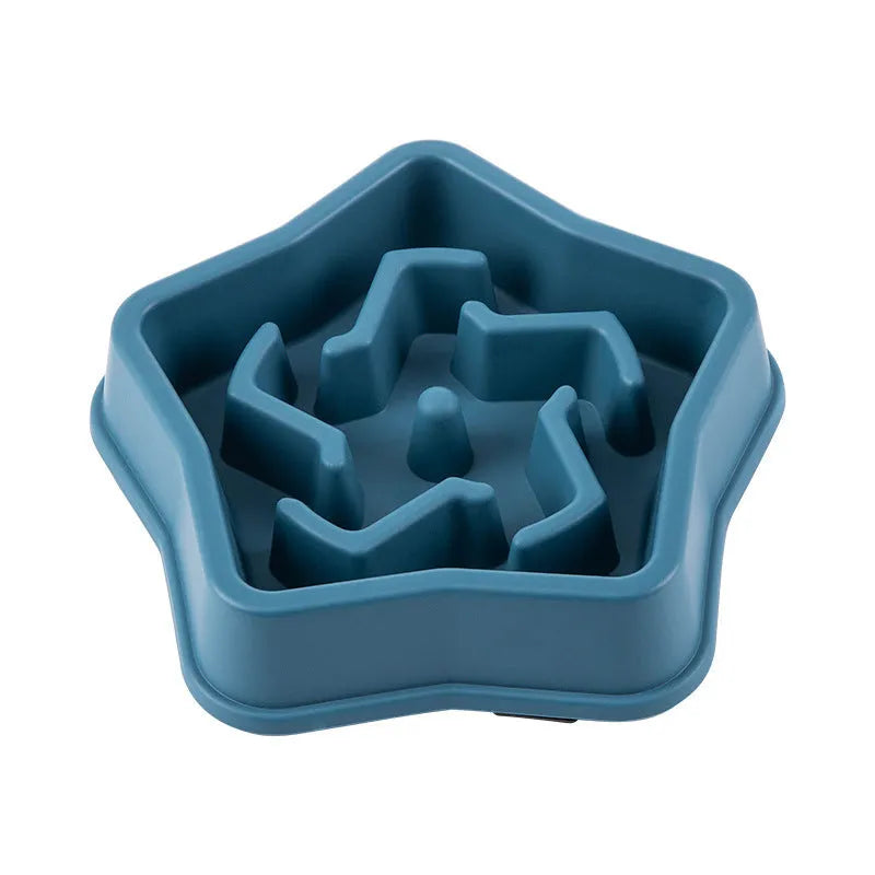 Yellow plastic dog slow feeder bowl with textured bottom and interior feeding obstacles