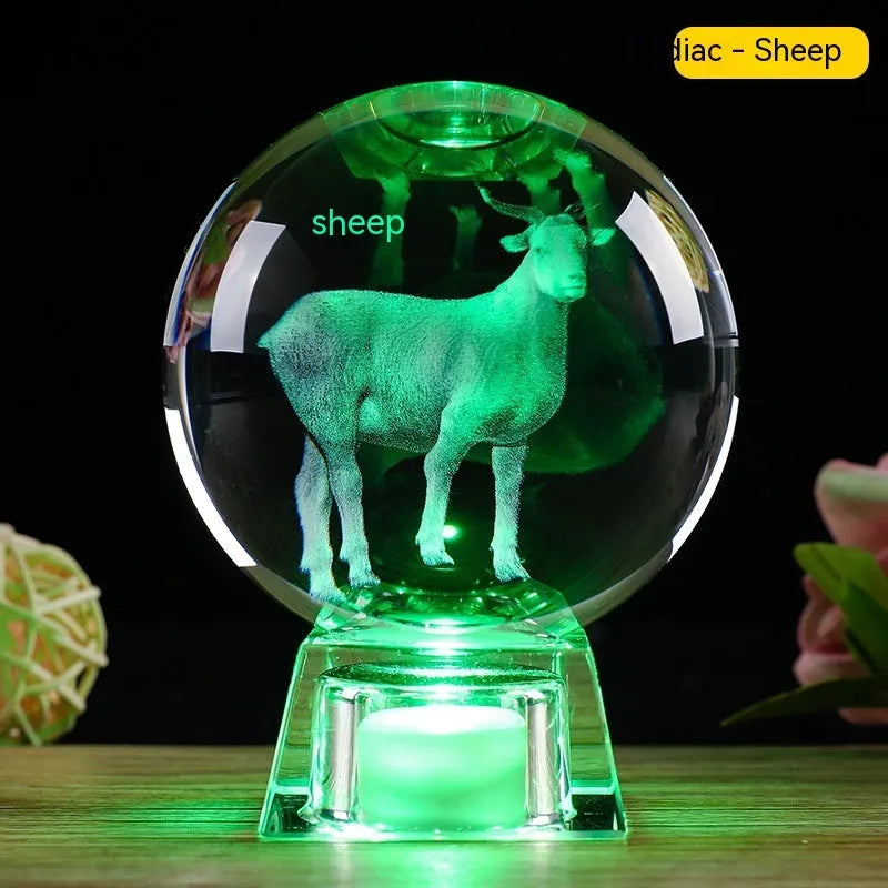White crystal ball luminous ornament with Chinese zodiac animal design on an electronic charging base.
