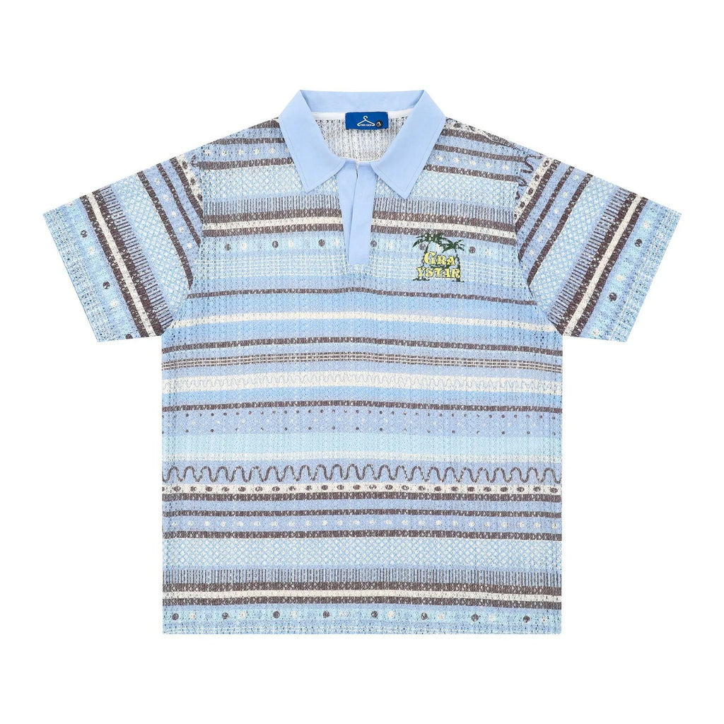 Man wearing a loose-fit blue printed short sleeve casual shirt made from polyester.