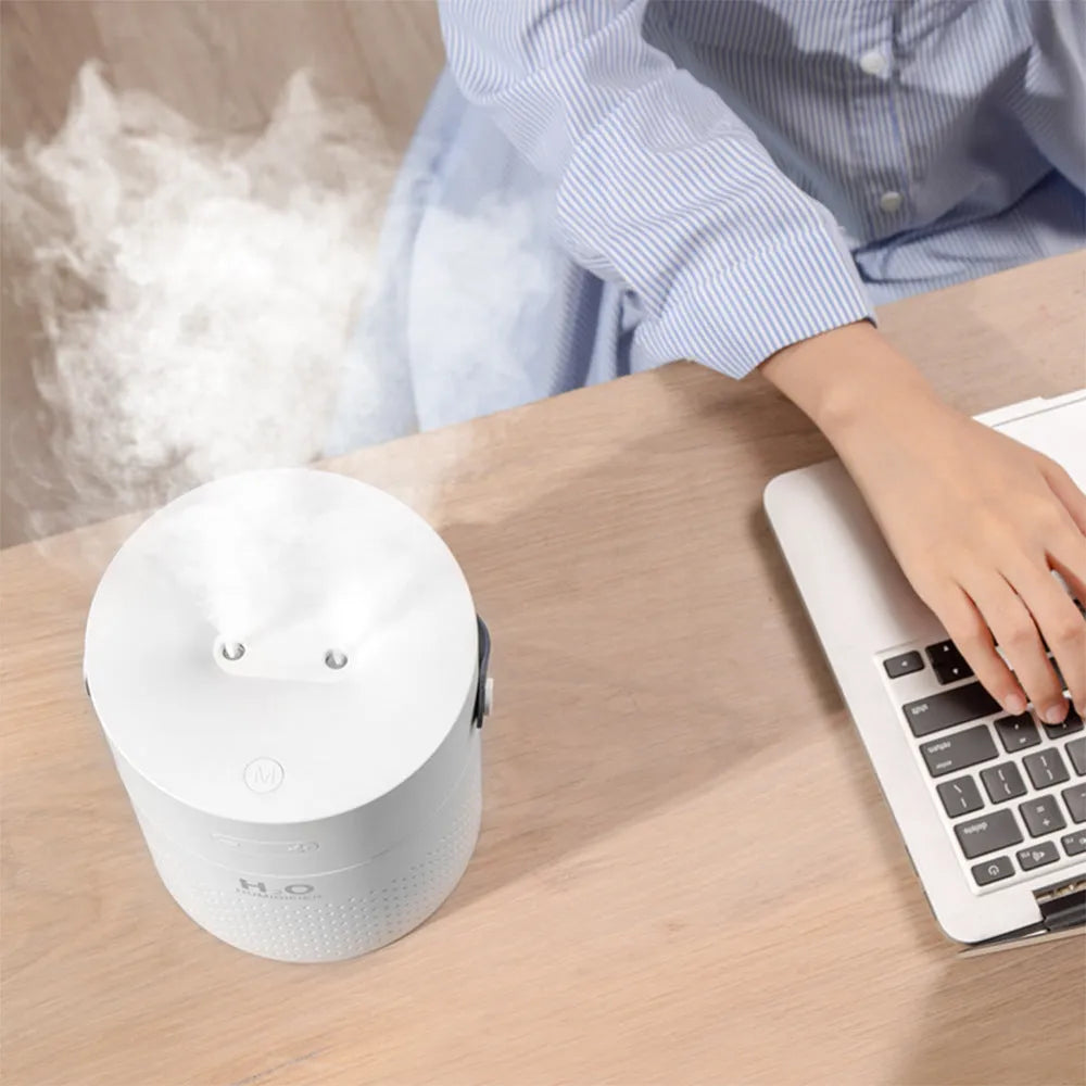 Green portable bedroom humidifier with USB charging cable and 1.1L water tank