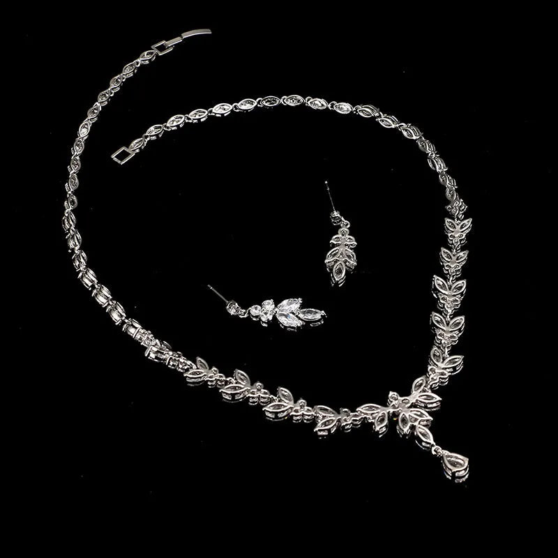 Women's alloy necklace and earrings set with gold-plated inlaid artificial gems and zircon chain on black box