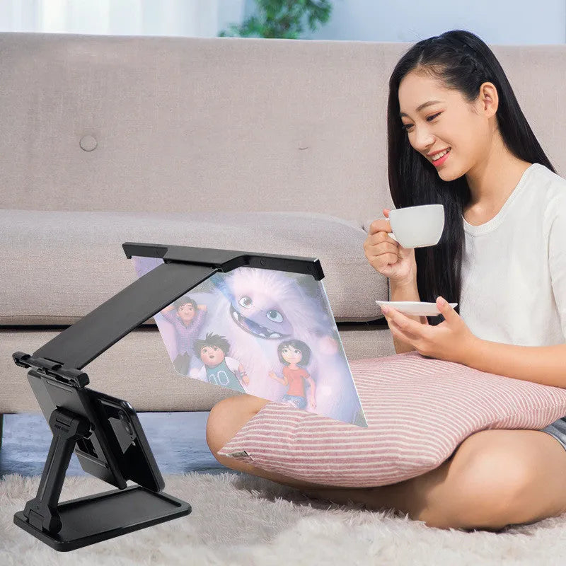Black mobile phone screen magnifier with 12-inch display and separate bracket stand