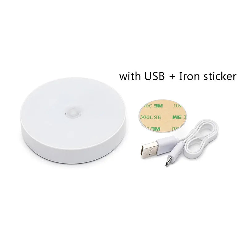 White circular motion sensor LED night light with USB charging cable and adhesive tape