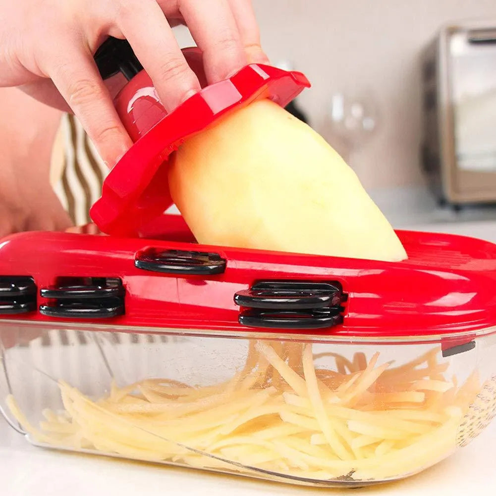 Red multifunctional vegetable cutter with seven stainless steel blades and a clear PET storage container.