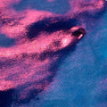Bottle of strong sheen gradient fountain pen ink with gold powder particles in Red Tide colour.