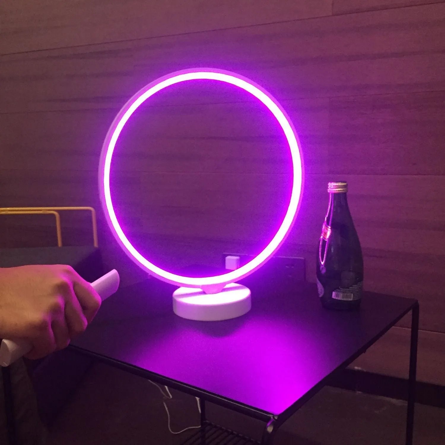 White Full Moon Mood Lamp table light with remote control on a surface.