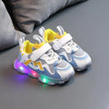 Children's bright light mesh sneakers with Velcro closure in black, grey, and pink colours