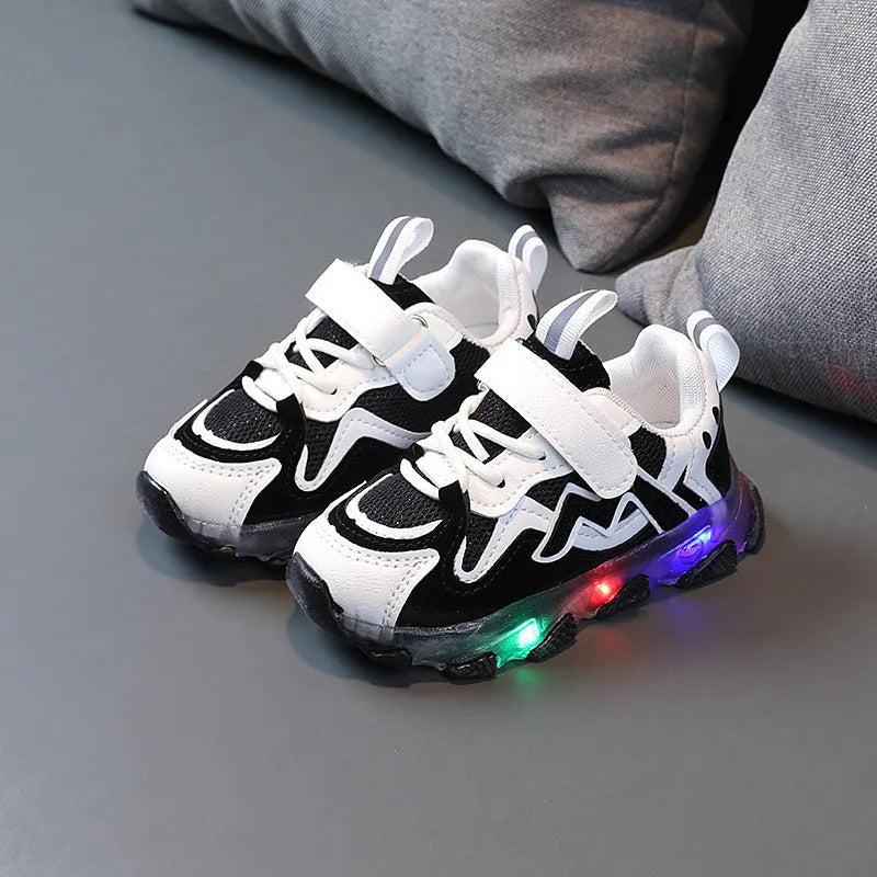 Children's bright light mesh sneakers with Velcro closure in black, grey, and pink colours
