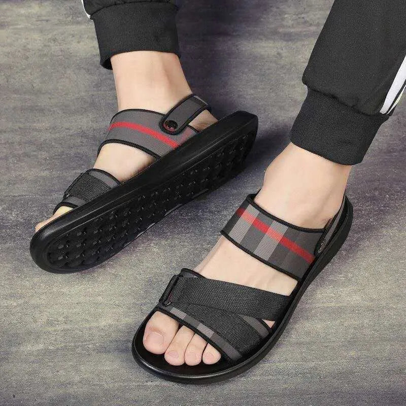 Youth sports sandals with elastic Lycra fabric upper and polyurethane sole, shown in a casual setting.