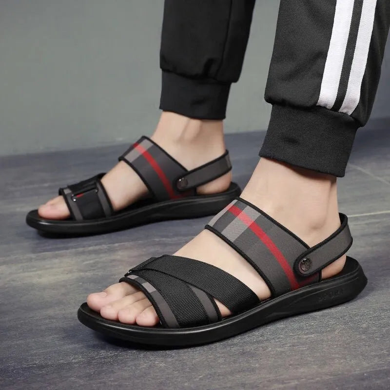 Youth sports sandals with elastic Lycra fabric upper and polyurethane sole, shown in a casual setting.
