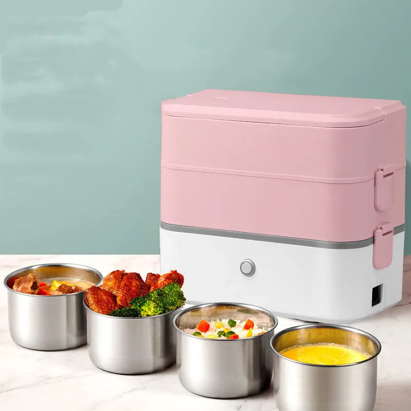 Pink and white portable heated lunch box with plug and push-button control.