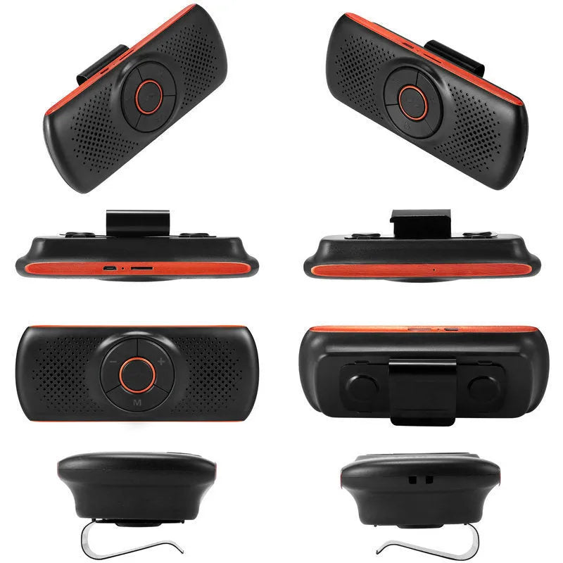 Orange plastic Bluetooth hands-free car speaker mounted on a sun visor for wireless phone calls and music.