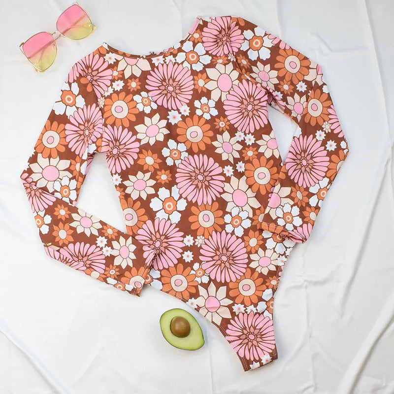 Long sleeve floral polyester swim bikini top for women with chest pad, available in S M L XL