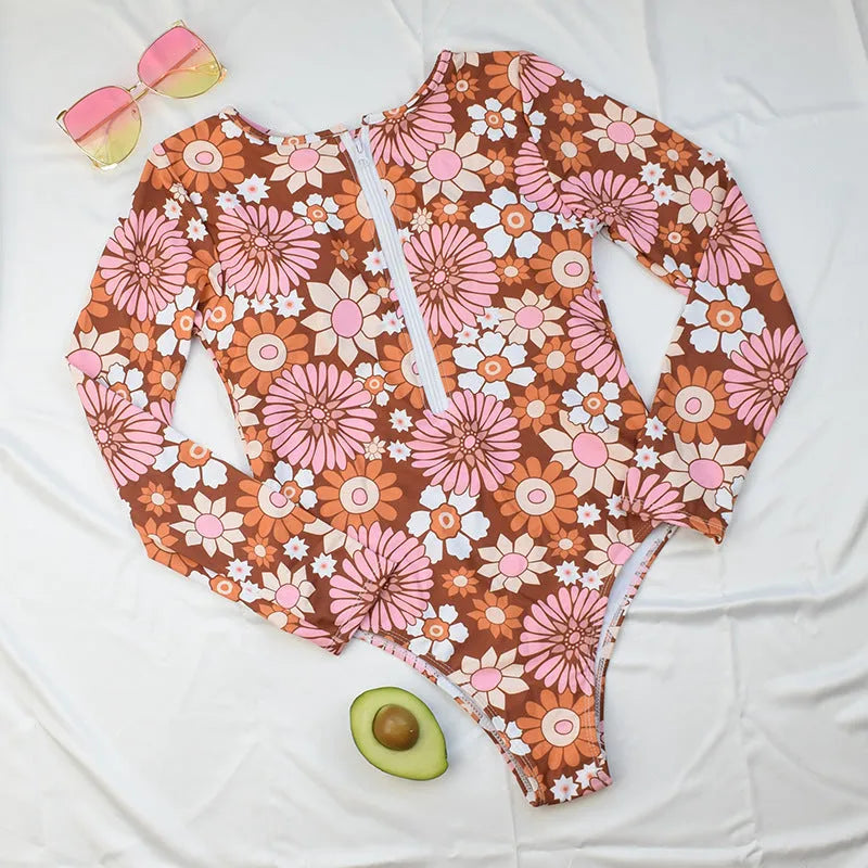 Long sleeve floral polyester swim bikini top for women with chest pad, available in S M L XL