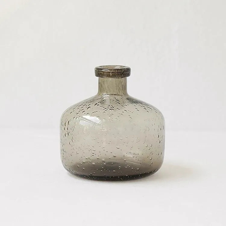 Grey geometric bubble glass vase with stained glass construction and textured surface