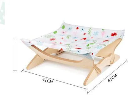 Pet wooden cat hammock with Passion Stripe cloth cover on a natural wood frame for indoor use