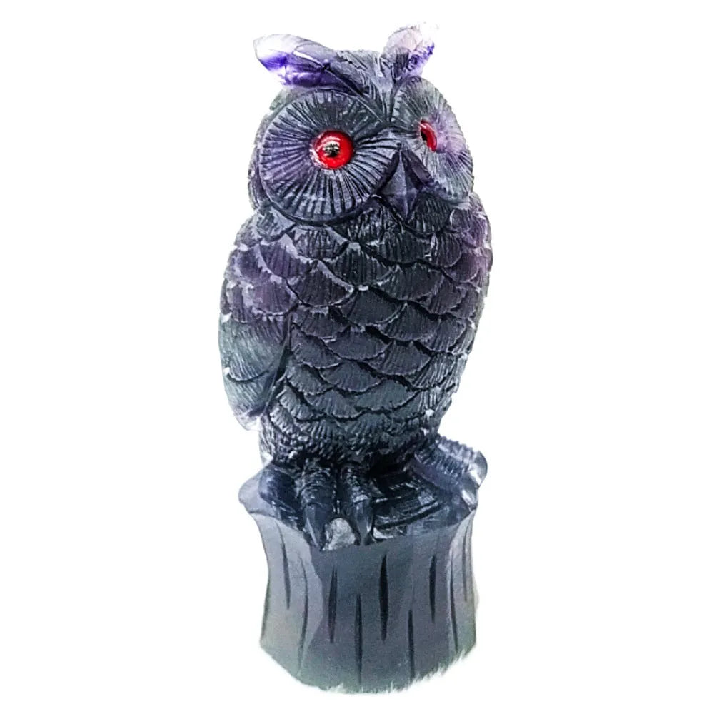 Purple fluorite hand-carved owl ornament approximately 4 inches tall with natural stone colour variations