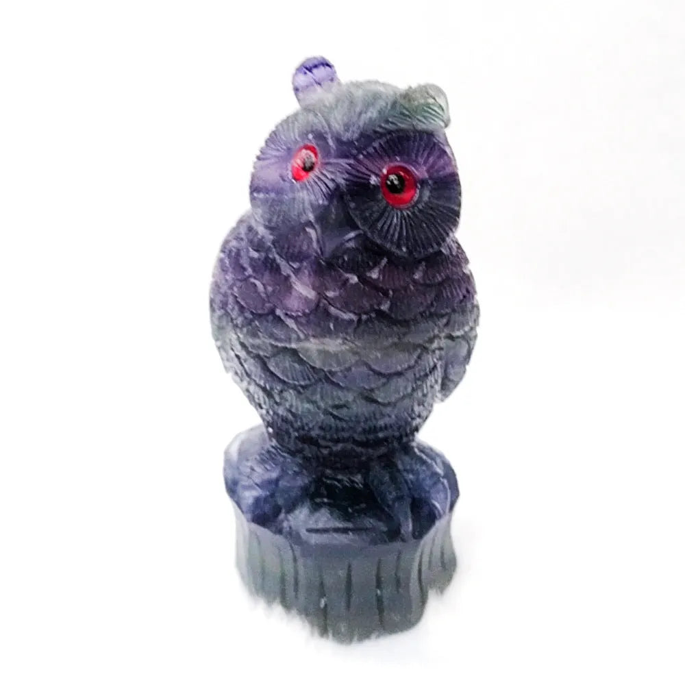 Purple fluorite hand-carved owl ornament approximately 4 inches tall with natural stone colour variations