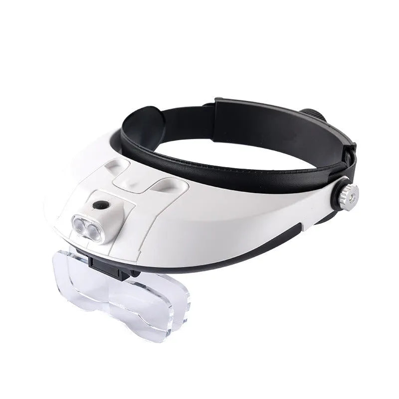 LED headband magnifier with five acrylic lenses and adjustable headband for hands-free close-up work