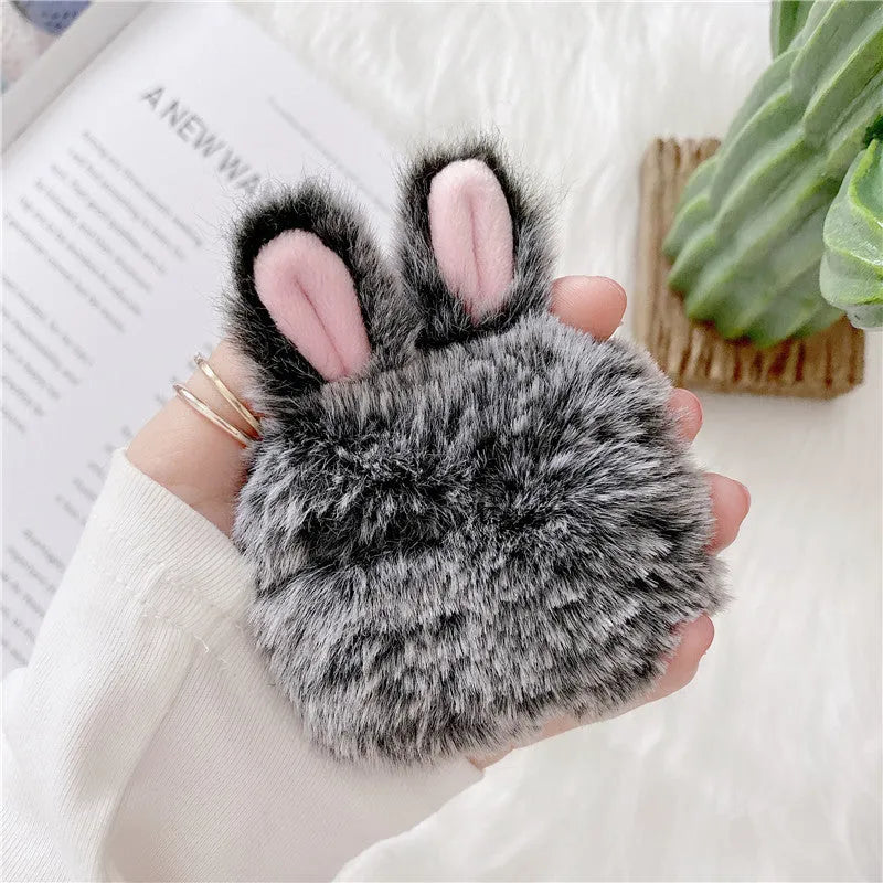 Pink silicone AirPods case cover with rabbit ears for AirPods Pro and 3rd generation.