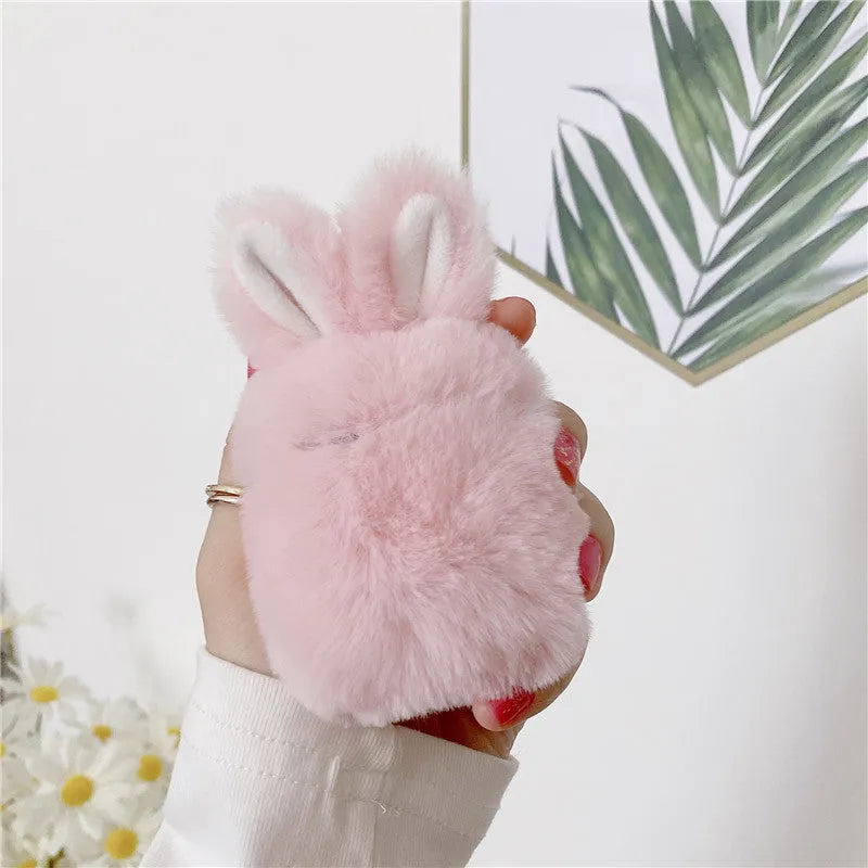 Pink silicone AirPods case cover with rabbit ears for AirPods Pro and 3rd generation.