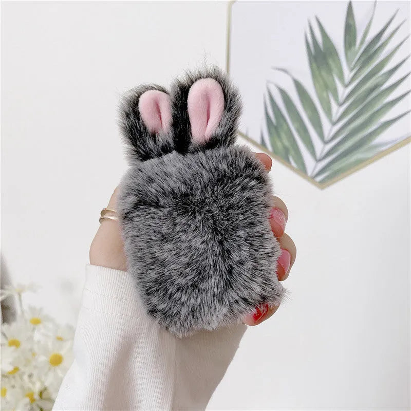 Pink silicone AirPods case cover with rabbit ears for AirPods Pro and 3rd generation.