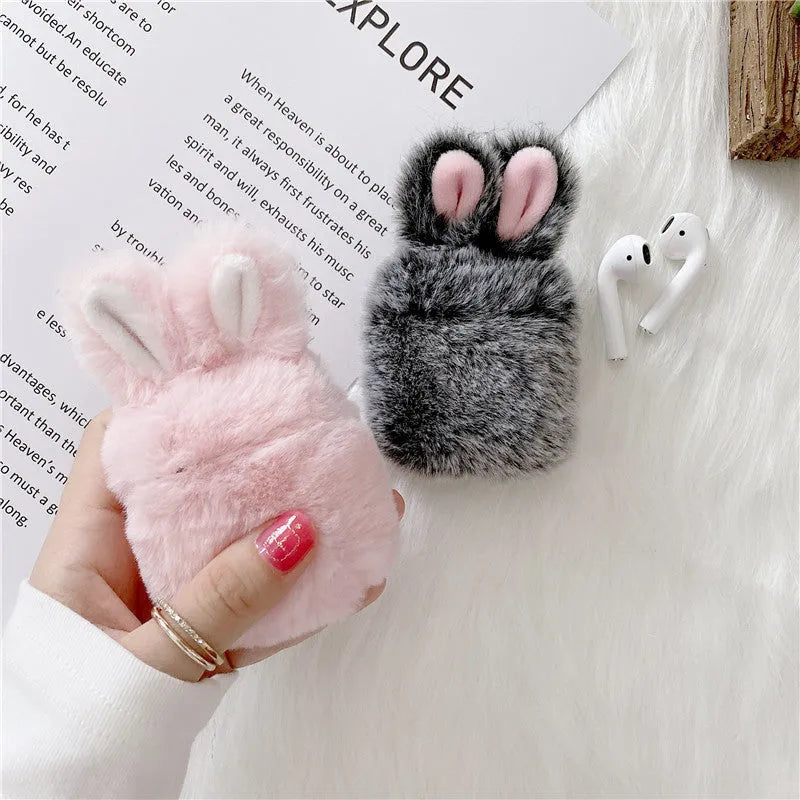 Pink silicone AirPods case cover with rabbit ears for AirPods Pro and 3rd generation.