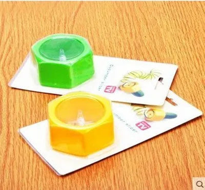 Yellow and green plastic spiral vegetable cutter for kitchen use with 8cm diameter measurements