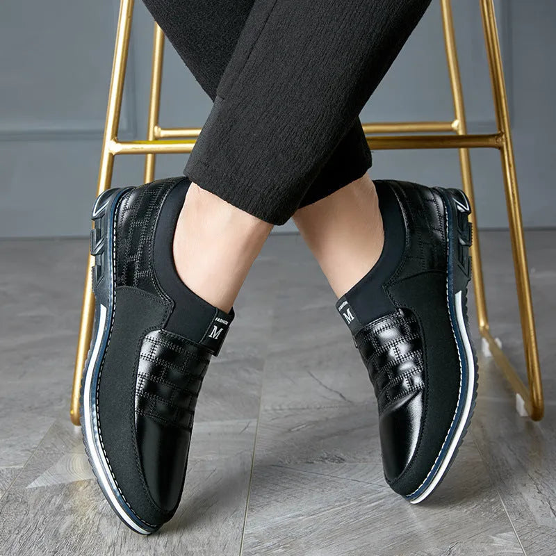 Men's black leather casual shoes with low cut design and viscose sole construction