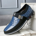 Men's black leather casual shoes with low cut design and viscose sole construction