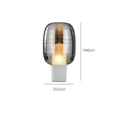 Modern Nordic style glass table lamp in cognac colour with LED light.