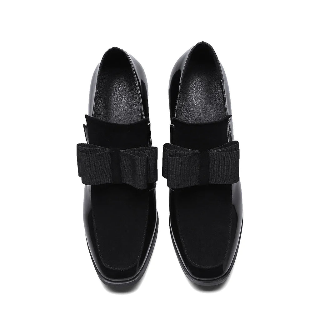 Black patent leather women's high-heel shoes with a thick heel and square toe.