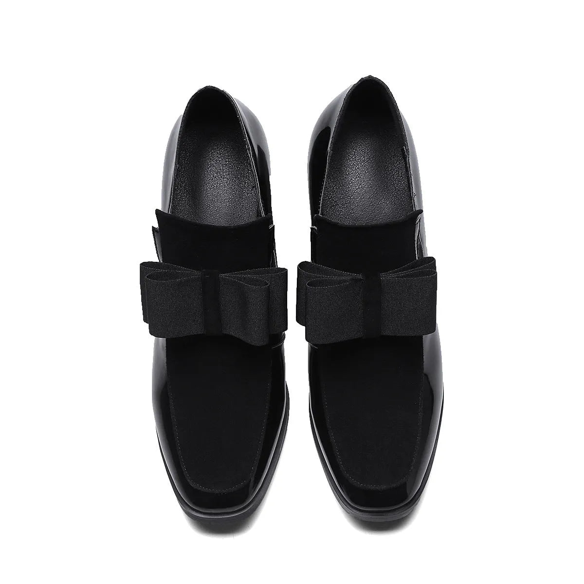 Black patent leather women's high-heel shoes with a thick heel and square toe.